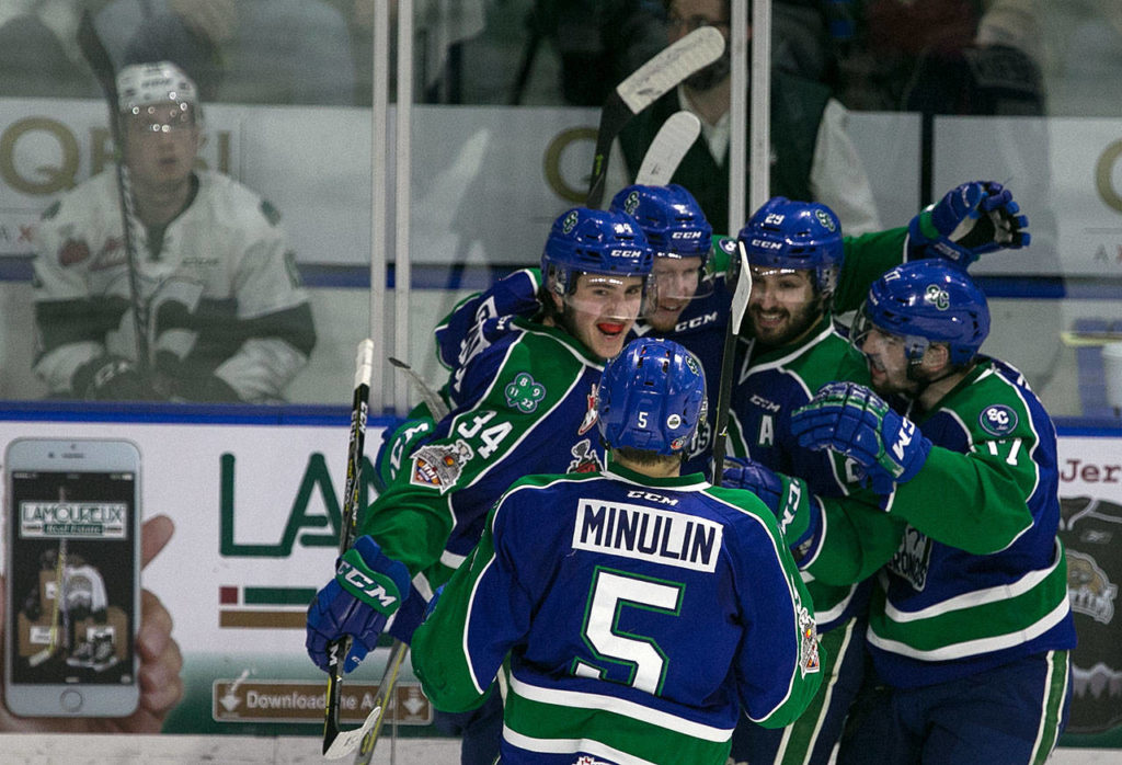 Swift Current players celebrates a goal by Colby Sissons in the second period of Game 4 of the WHL finals on May 9, 2018, at Angel of the Winds Arena in Everett. (Kevin Clark / The Herald)
