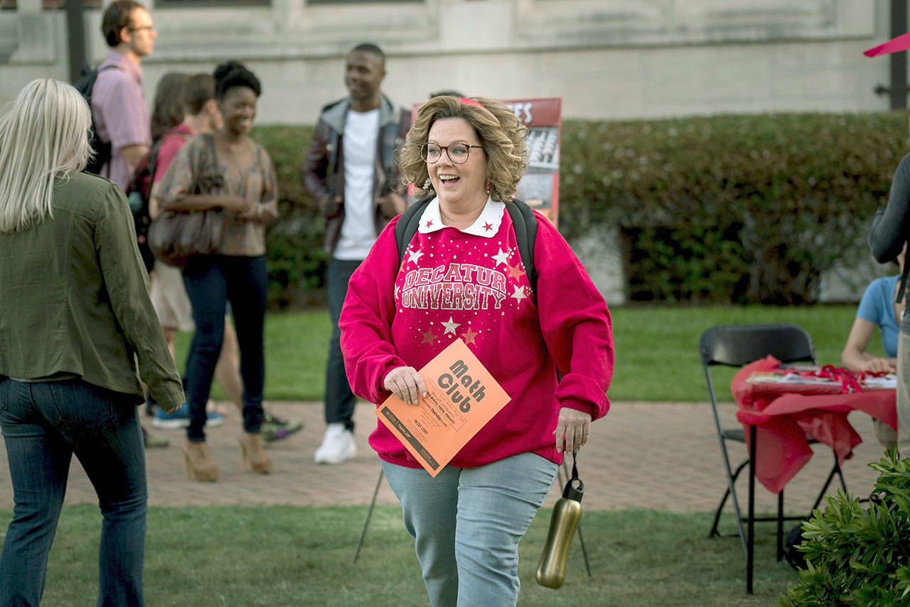 Melissa McCarthy plays a housewife who, after getting dumped by her husband, goes back to college … landing in the same class and school as her daughter, who’s not entirely sold on the idea, in “Life of the Party.” (Hopper Stone/Warner Bros. Pictures via AP)