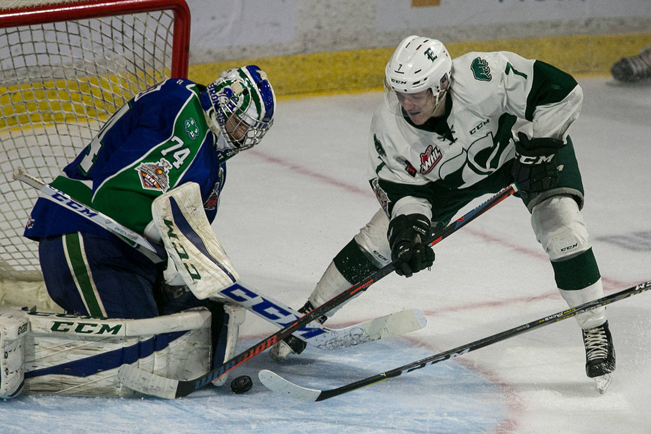 The Silvertips’ Martin Fasko-Rudas works to score with Swift Current’s Stuart Skinner defending during Game 5 of the WHL championship series on May 11, 2018, at Angel of the Winds Arena in Everett. (Kevin Clark / The Herald)