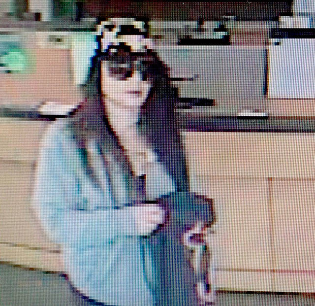 This woman allegedly robbed a Washington Federal bank, escaped and abandoned her getaway car Friday in Lynnwood. (Lynnwood Police Department)