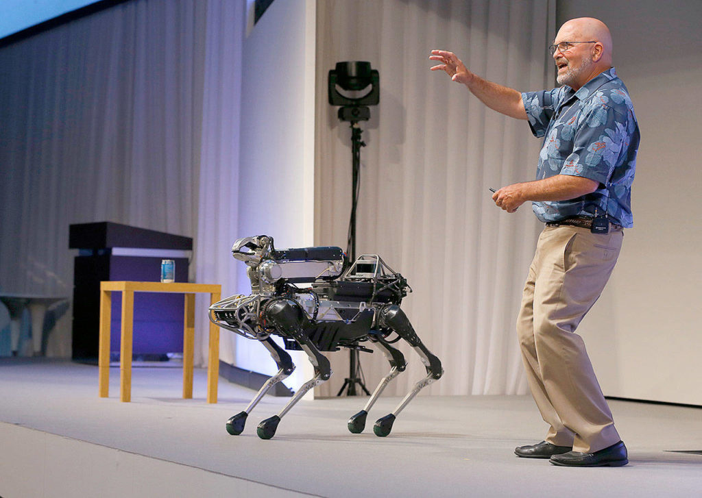 Boston Dynamics also plans to sell a dog-like four-legged robot to businesses for use as a camera-equipped security guard. (Shizuo Kambayashi / Associated Press)
