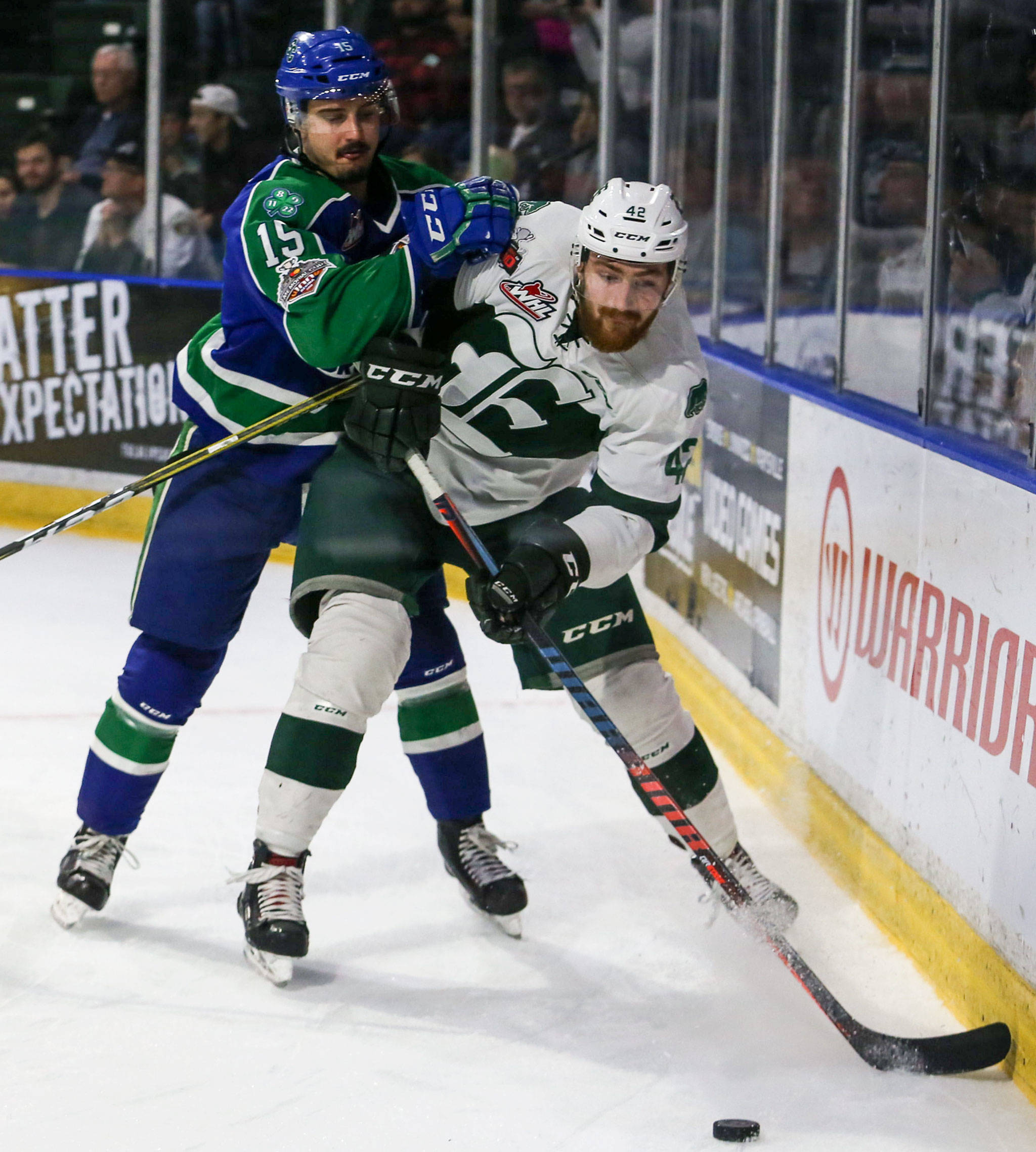 The Silvertips’ Ondrej Vala (right) battles with Swift Current’s Glenn Gawdin during Game 5 of the WHL championship series on May 11, 2018, at Angels of the Winds Arena in Everett. (Kevin Clark / The Herald)