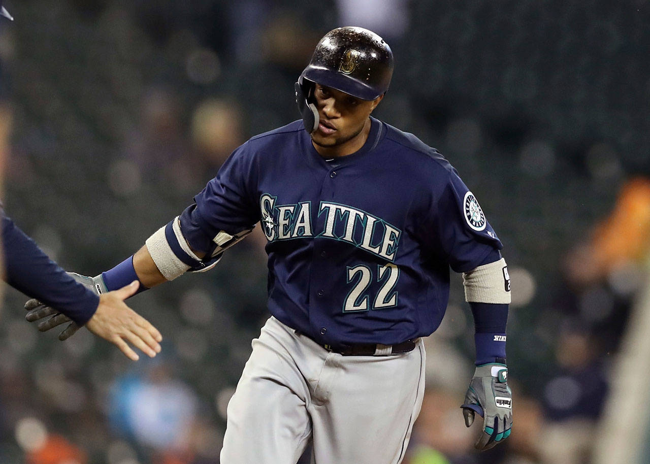 The Mariners’ Robinson Cano rounds third base after hitting a three-run home run during the fifth inning of the second game of a doubleheader against the Tigers on May 12, 2018, in Detroit. (AP Photo/Carlos Osorio)