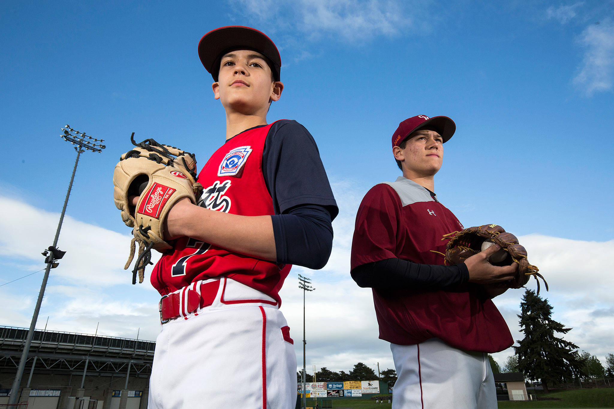 Lopez brothers Zachary, left, and Gabe threw no-hitters 10 minutes apart April 30. Gabe was an ace for the Cascade High School junior varsity baseball team and Zachary dazzled for Everett Little League’s Cardinals majors division team. (Andy Bronson / The Herald)