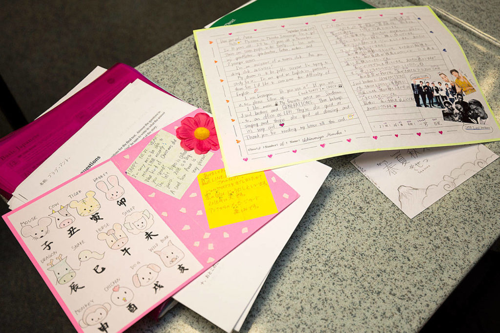 A New Year’s Day card written in Japanese and English sits on a desk at Mariner High School, which joined a pen pal project 10 years ago with Itoshima High School in Fukuoka, Japan. (Andy Bronson / The Herald)
