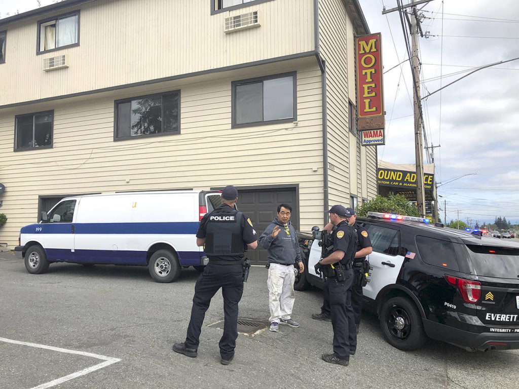 A person was shot in Everett on Wednesday. Police were searching for the suspect. (Andy Bronson / The Herald)
