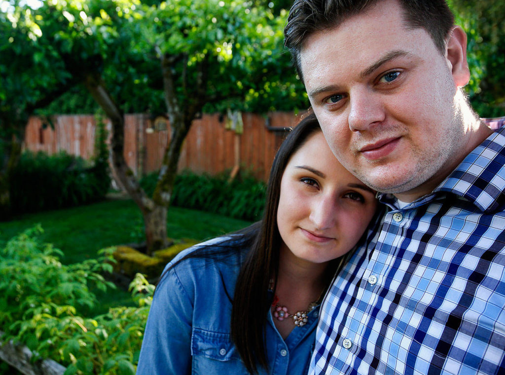 Bryan and April Fugate talk about his treatment for schizophrenia and how it has affected their lives. The couple, Marysville natives and former high school sweethearts, will soon walk in a fundraising event to benefit mental illness programs. (Dan Bates / The Herald)
