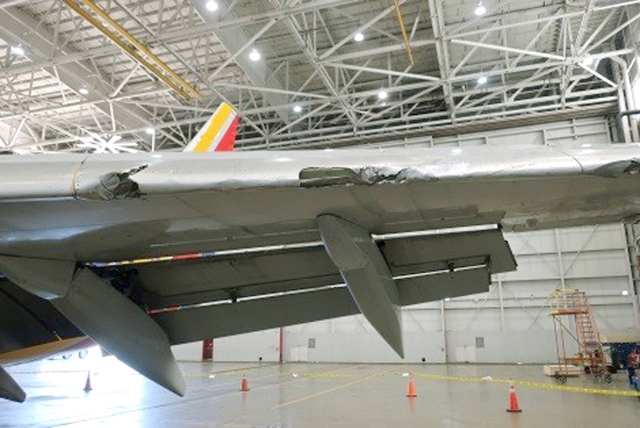 This photo shows damage to the leading edge of the left wing of the Southwest Airlines jet that made an emergency landing at Philadelphia International Airport in Philadelphia on April 17. (NTSB via AP)