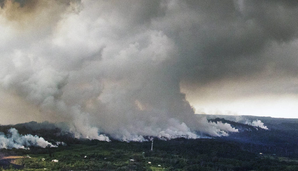 A plume of volcanic steam rises from the alignment of fissures in Hawaii’s Kilauea East Rift zone on Wednesday. (Cindy Ellen Russell/Honolulu Star-Advertiser via AP)
