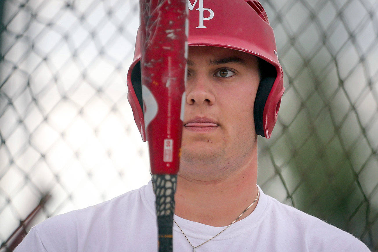 Colby Phelps prepares to bat during practice Thursday afternoon at Marysville-Pichuck High School in Marysville on May 17, 2018. (Kevin Clark / The Herald)