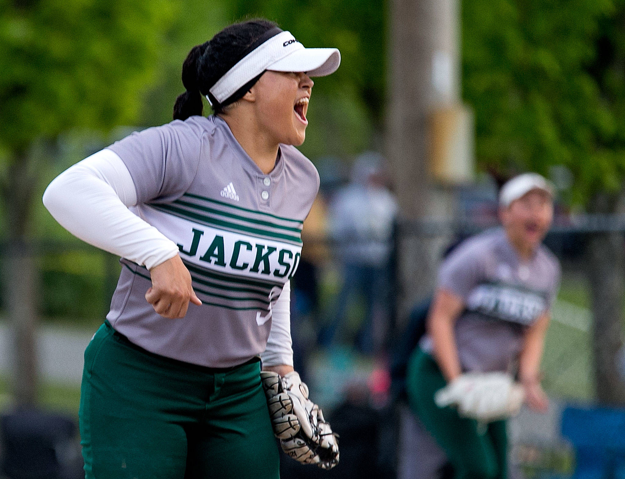 Jackson pitcher Iyanla Pennington celebrates after shutting out Monroe 2-0 in the 4A district championship on May 17, 2018, in Everett. (Kevin Clark / The Herald)