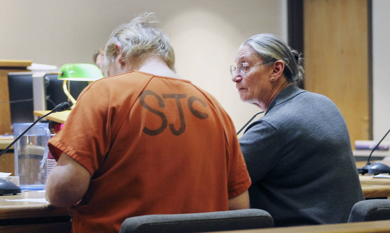 Eric Kulp (left) talks with his council, Colleen Kenimond. (Heather Spaulding/Journal of the San Juans)