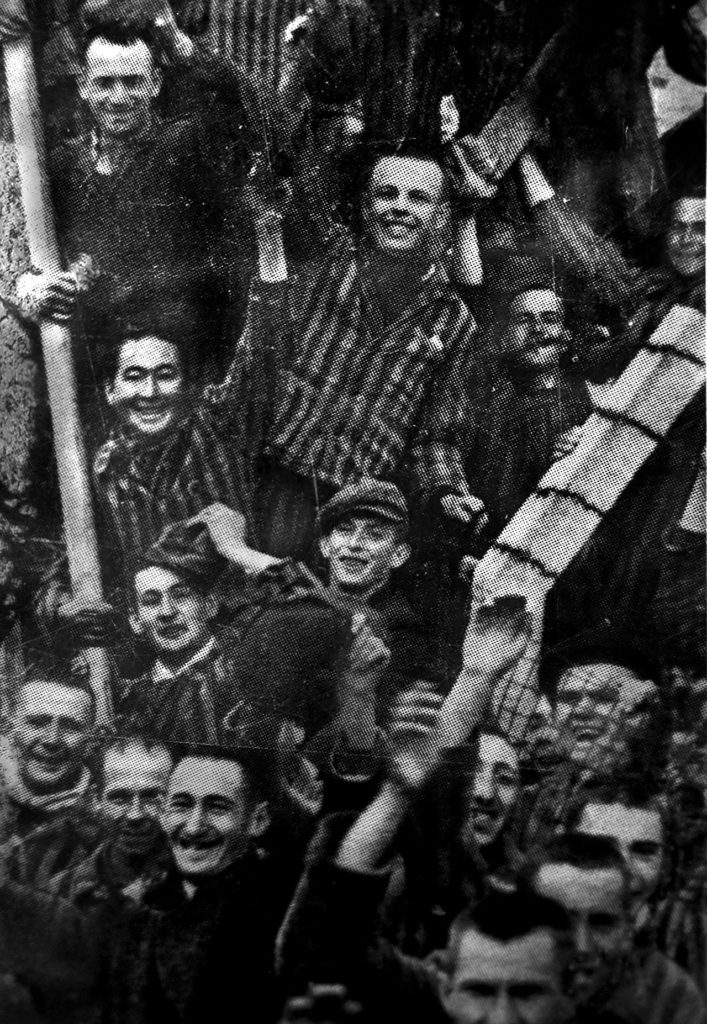 Paul Bochan, a Polish native who later lived in rural Snohomish, is seen at center, wearing a cap, in this picture taken by an American soldier when the Dachau concentration camp was liberated during World War II. Bochan was imprisoned at the camp before coming to the United States as a refugee. (Courtesy of Jean Bochan)

