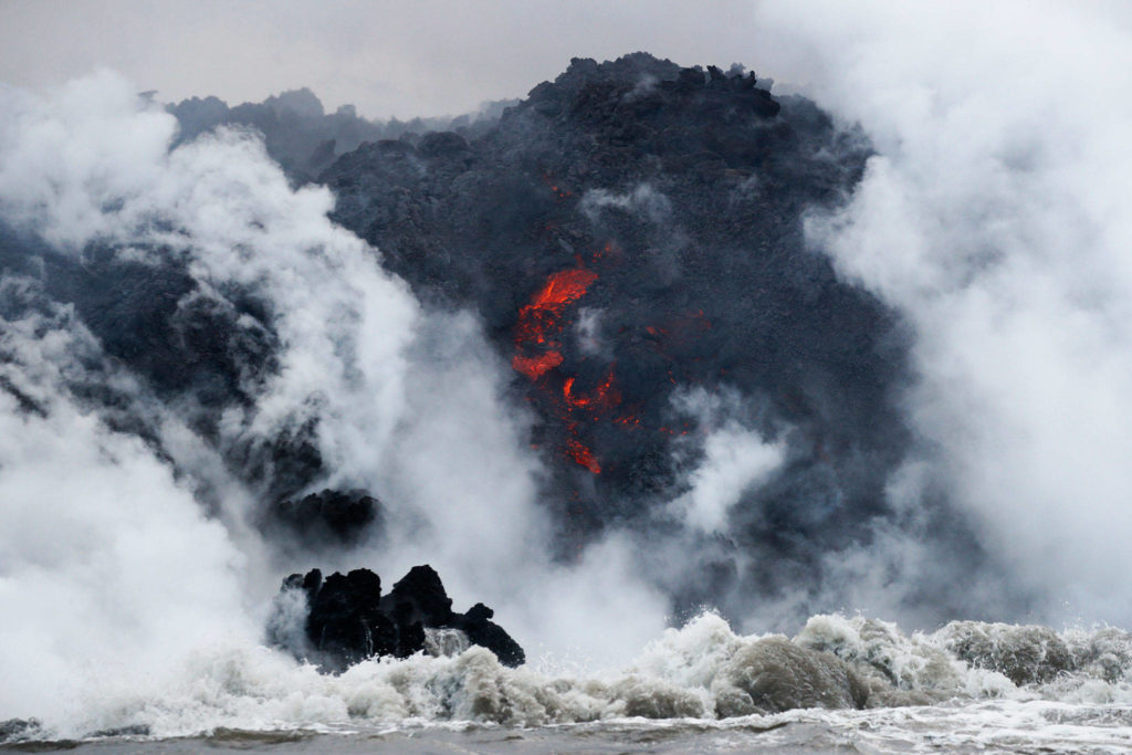 Lava flows into the ocean near Pahoa, Hawaii on May 20. (AP Photo/Jae C. Hong)
