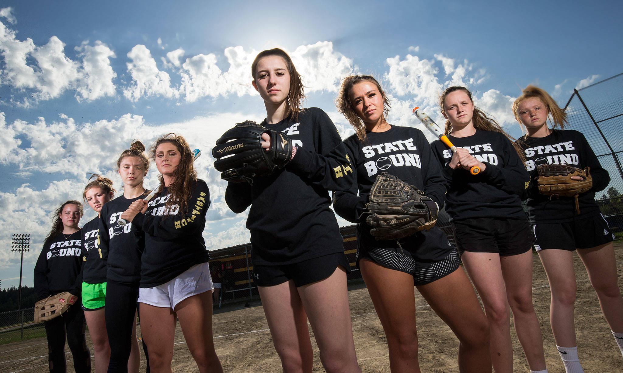 Members of the Lakewood High School softball team pose for a photo at the school on Wednesday. Lakewood opens state play on Friday in Selah. (Andy Bronson / The Herald)