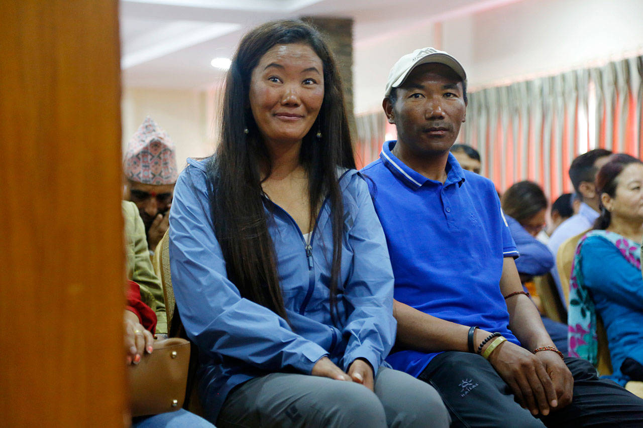 Nepalese climber Lhakpa Sherpa waits for a honorary function to begin in Kathmandu, Nepal, on Wednesday. Lhakpa Sherpa scaled the 29,035-foot Mount Everest last week, breaking her own record for the most climbs by a woman. (Niranjan Shrestha / Associated Press)