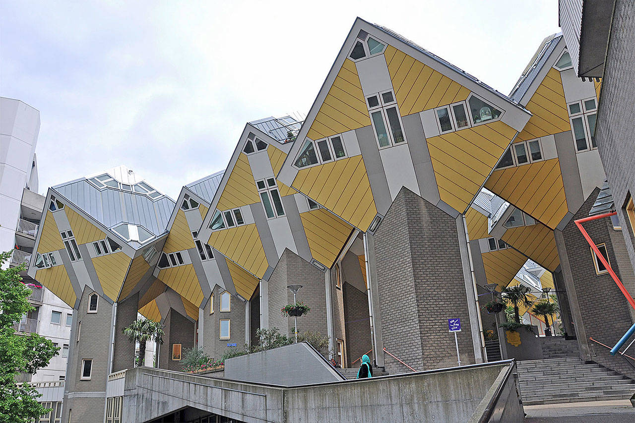Rotterdam’s Cube Houses are emblematic of postwar architecture — 39 tilted yellow cubes, each a single-family home. (Cameron Hewitt / Rick Steves’ Europe)