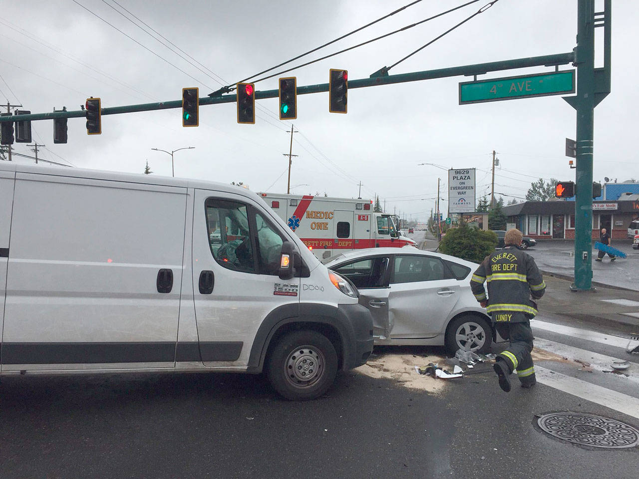 A crash at the intersection of 4th Avenue W and Evergreen Way sent one driver to the hospital and blocked traffic Thursday morning. (Everett Police Department photo)