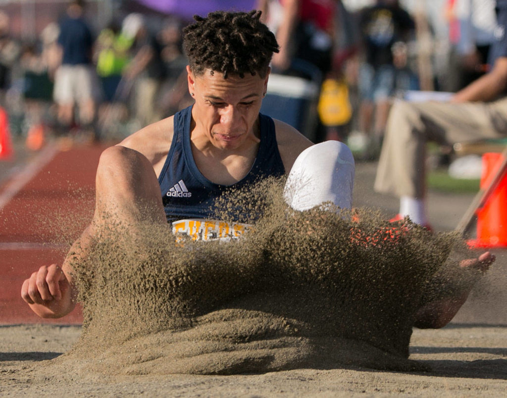 Everett’s Elijah Ross-Rutter competes in the triple jump event Thursday at the WIAA track and field state championships at Mount Tahoma High School in Tacoma. (Kevin Clark / The Herald)
