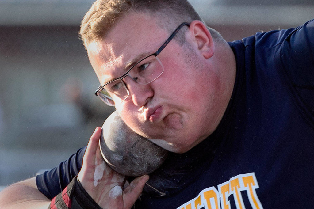 Everett’s Ben Howard competes in the shot put Thursday at the WIAA track and field state championships at Mount Tahoma High School in Tacoma. (Kevin Clark / The Herald)
