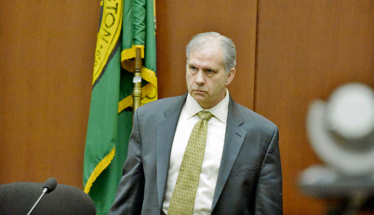 John Reed takes the stand on Friday in Snohomish County Superior Court in Everett. (Caleb Hutton / Herald file)