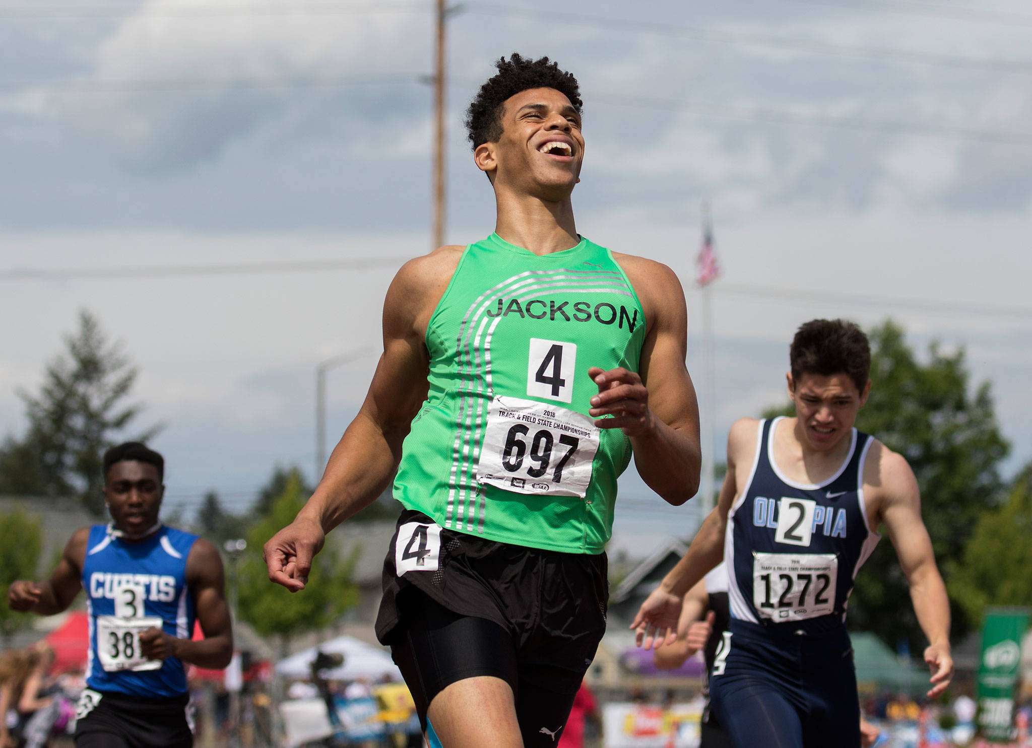 Jackson’s Daniel Arias smiles after winning the 400-meter dash at the 4A state track and field championships on May 26, 2018, at Mount Tahoma High School in Tacoma. (Patrick Hagerty photo)