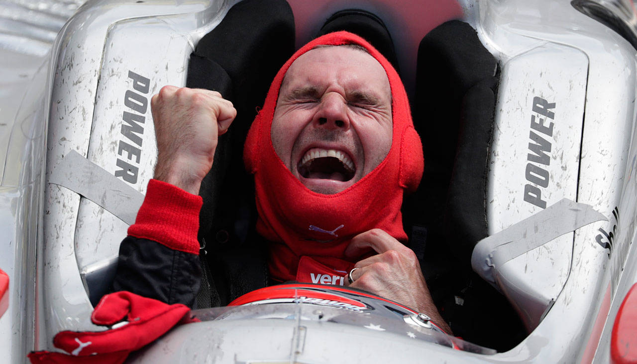 Will Power celebrates after winning the Indianapolis 500 on May 27, 2018, at Indianapolis Motor Speedway in Indianapolis. (AP Photo/Michael Conroy)