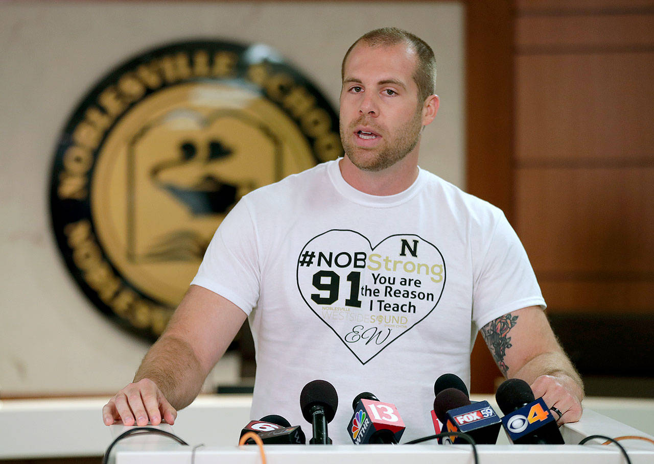 Jason Seaman, a seventh grade science teacher at Noblesville West Middle School in Noblesville, Indiana, speaks to the media during a press conference Monday. (AP Photo/Michael Conroy)