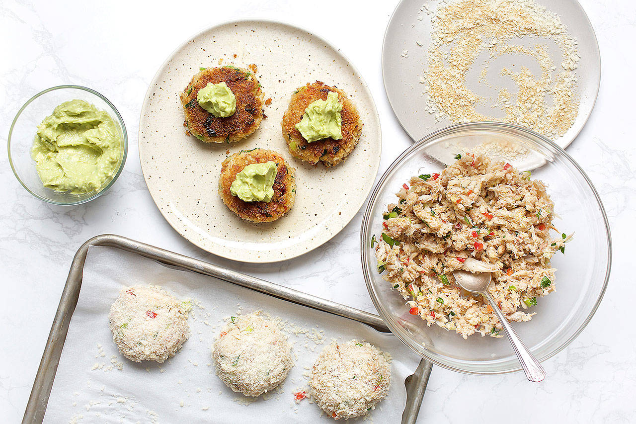 Mini crab cakes topped with avocado wasabi sauce. (Photo by Deb Lindsey for The Washington Post)