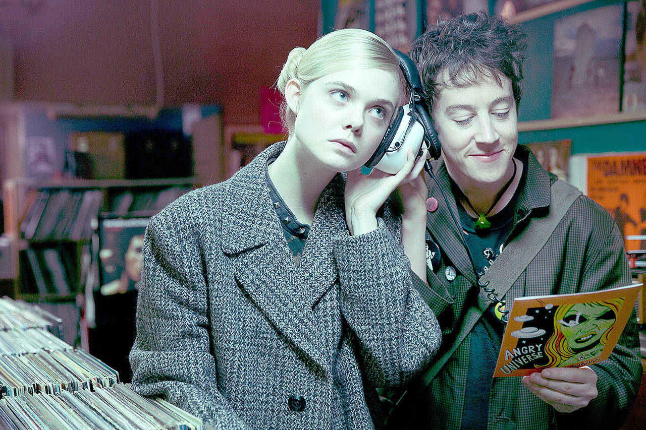 Elle Fanning plays the alien Zan and Alex Sharp is the human punk rocker Enn in “How to Talk to Girls at Parties.” (A24)