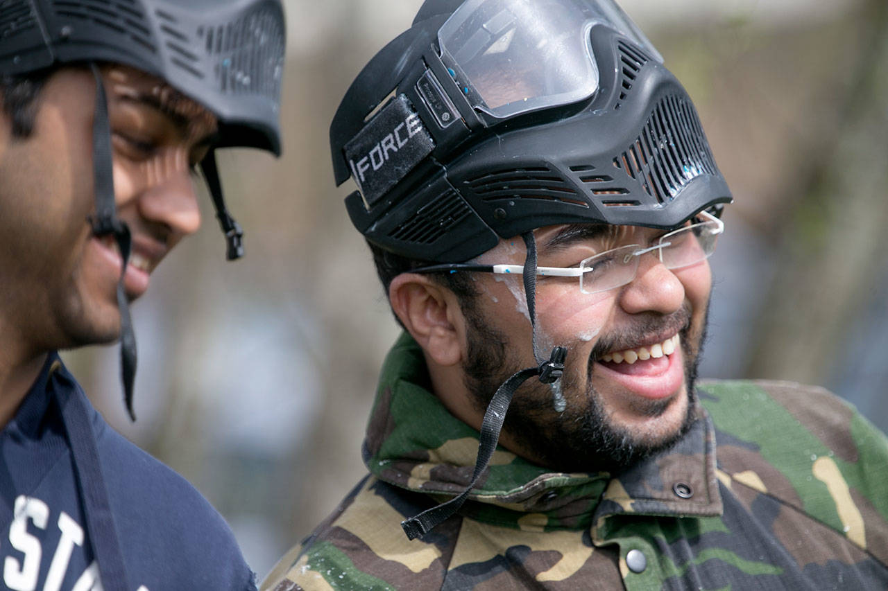 Ayushman Dutta (right) shares a laugh at Doodlebug Sportz in Snohomish Saturday afternoon on March 31, 2018. (Kevin Clark / The Daily Herald)