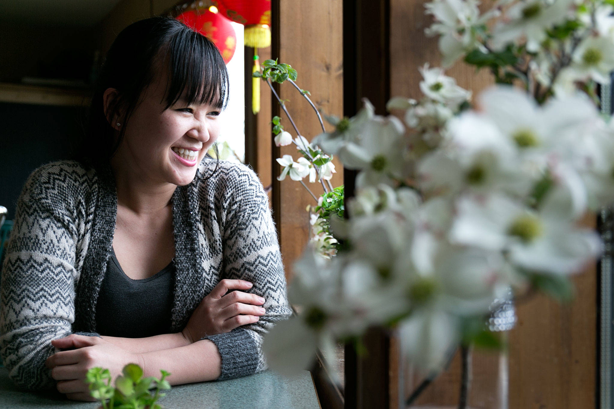 Mysa Tran, 29, bought Riverview Market & Cafe in Lowell in 2016 and added a menu with American and Asian cuisine to expand the customer base. (Kevin Clark / The Herald)