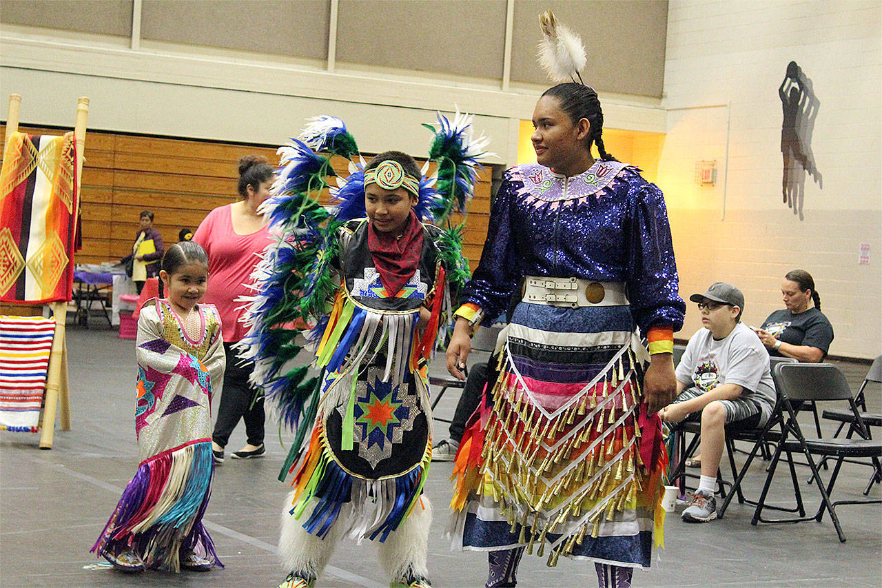 Nakia Sabbas, Seattle Sabbas and Ayana Sabbas with the Terrance Sabbas Family Drum Group perform at a Festival of World Cultures, held May 18 at Totem Middle School in Marysville. (Contributed photo)