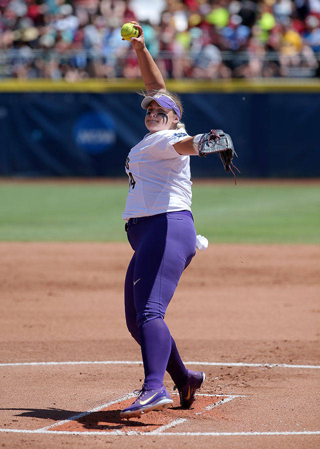 Washington’s Taran Alvelo pitches against Oklahoma on Sunday at the Women’s College World Series in Oklahoma City. Alvelo and the Huskies won 3-0. (Sarah Phipps/The Oklahoman via AP)