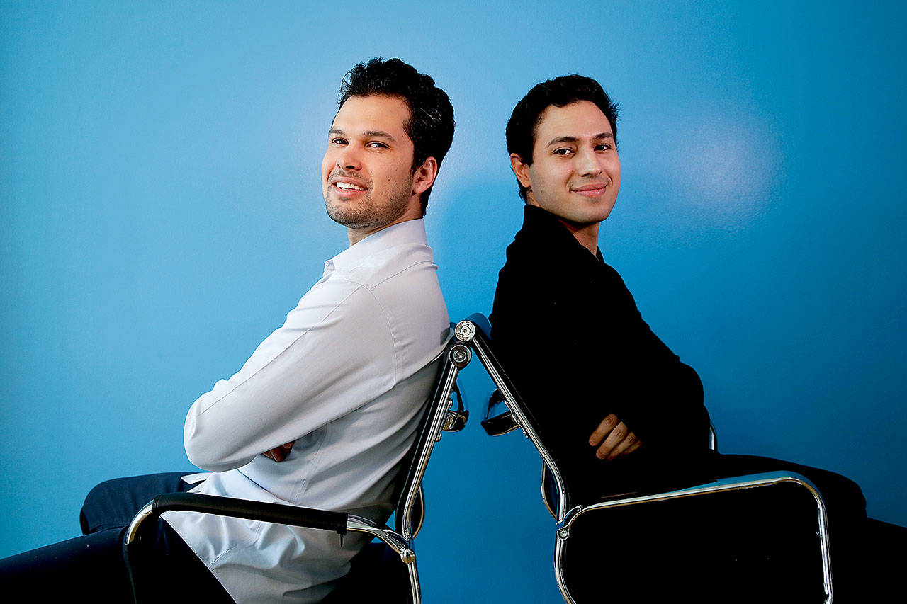 Ryan Neman (right) and Skyler Lucci, owners of HeyTutor, are seen in Los Angeles on May 31. (AP Photo/Chris Carlson)