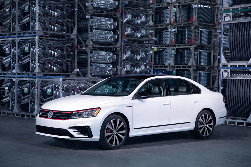 A new GT variant of the 2018 Volkswagen Passat includes GTI-inspired exterior touches such as a front red accent line and red brake calipers. (Manufacturer photo)
