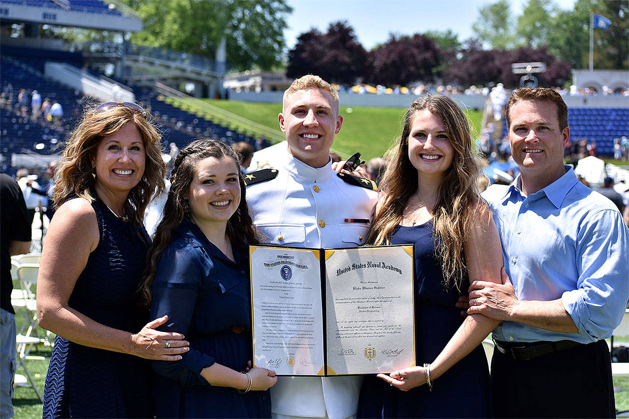 Blake Guidice (center) celebrates his graduation from the U.S. Naval Academy with his family, including (from left) mom Crystal, sisters Brielle and Brooke, and dad Walt. (Contributed photo)