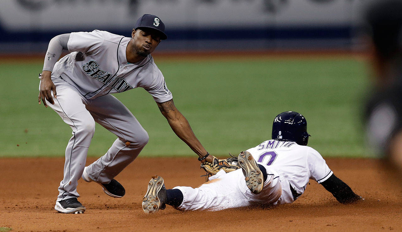 Seattles Dee Gordon tags out Tampa Bays Mallex Smith trying to steal second base during the eighth inning of Saturdays game in St. Petersburg, Fla. (AP Photo/Chris OMeara)