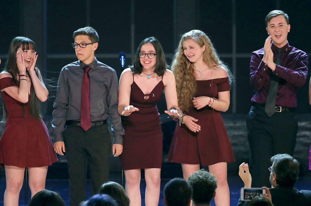 Students from the Marjory Stoneman Douglas High School drama department react after performing “Seasons of Love” at the 72nd annual Tony Awards at Radio City Music Hall on Sunday in New York. (Photo by Michael Zorn/Invision/AP)