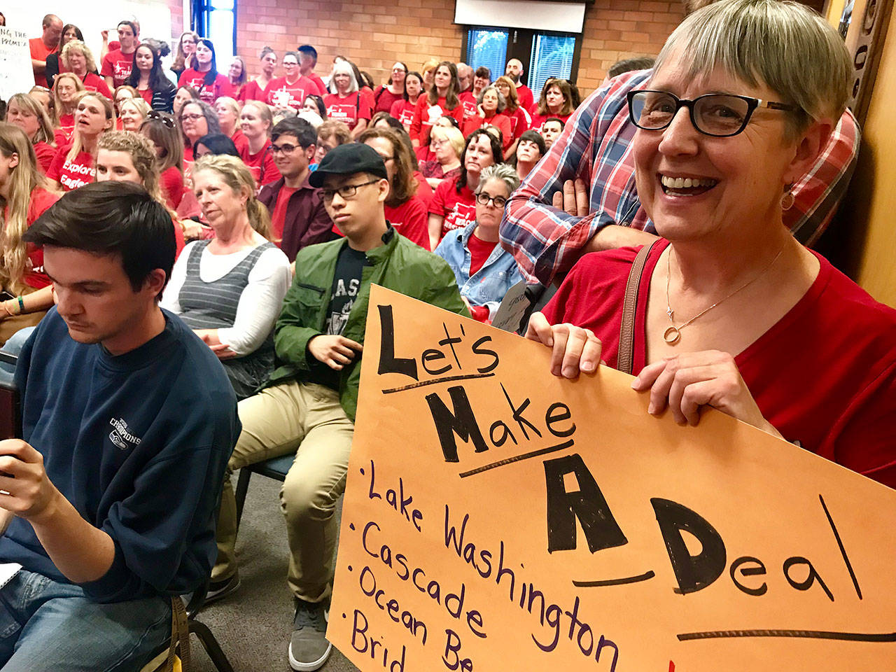 Teachers in the Mukilteo School District jammed a school board meeting Monday night, urging elected officials to renegotiate salaries. Less than two hours earlier, the teachers’ union passed a vote of no confidence in Superintendent Marci Larsen and gave a bargaining team authority to call for a strike if there is not a tentative agreement to consider by Aug. 15 . (Andrea Brown / The Herald)