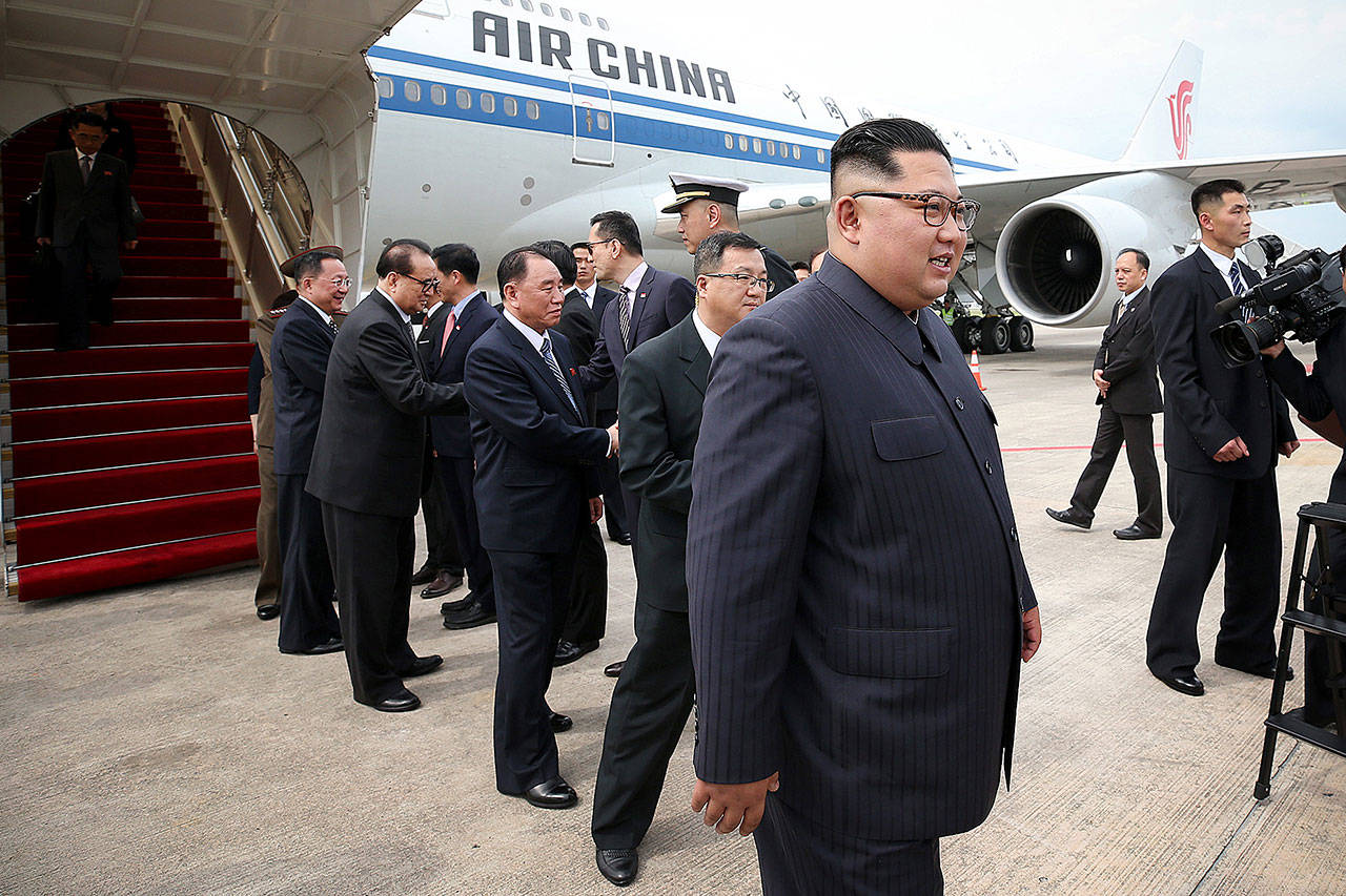North Korean leader Kim Jong Un arrives on a Chinese 747 on Sunday in Singapore. (Ministry of Communications and Information of Singapore)
