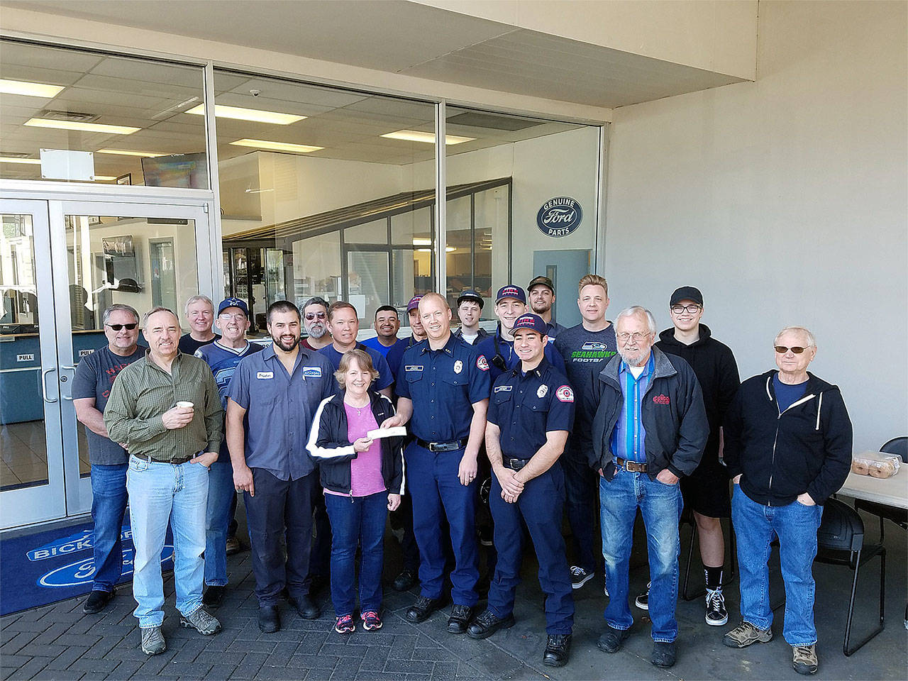 Volunteers and donors at this year’s Bickford Car Care Clinic helped 10 low-income families in Everett have safer and more reliable transportation. (Contributed photo)