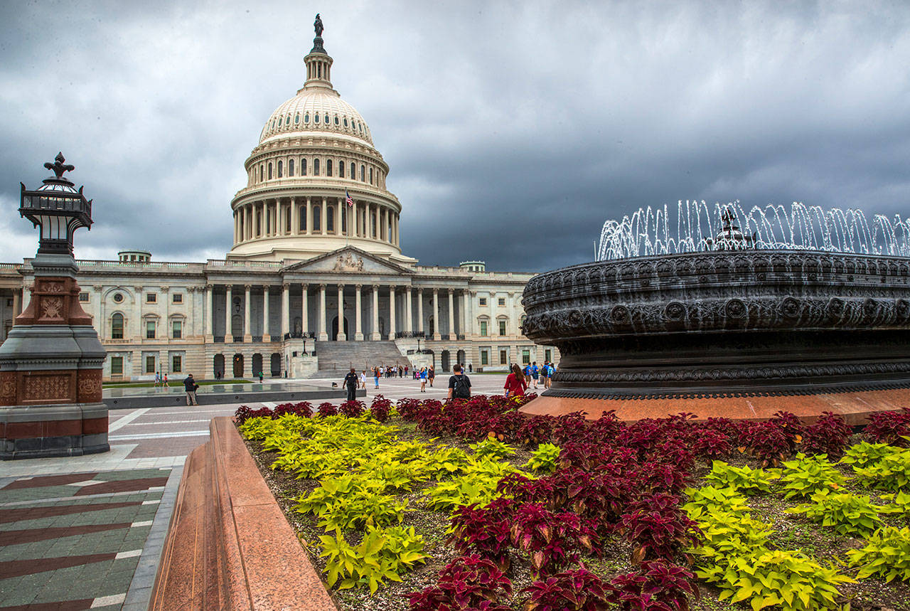 In this May 30 photo, the East Front of the U.S. Capitol in Washington is seen under stormy skies. (AP Photo/J. Scott Applewhite, File)