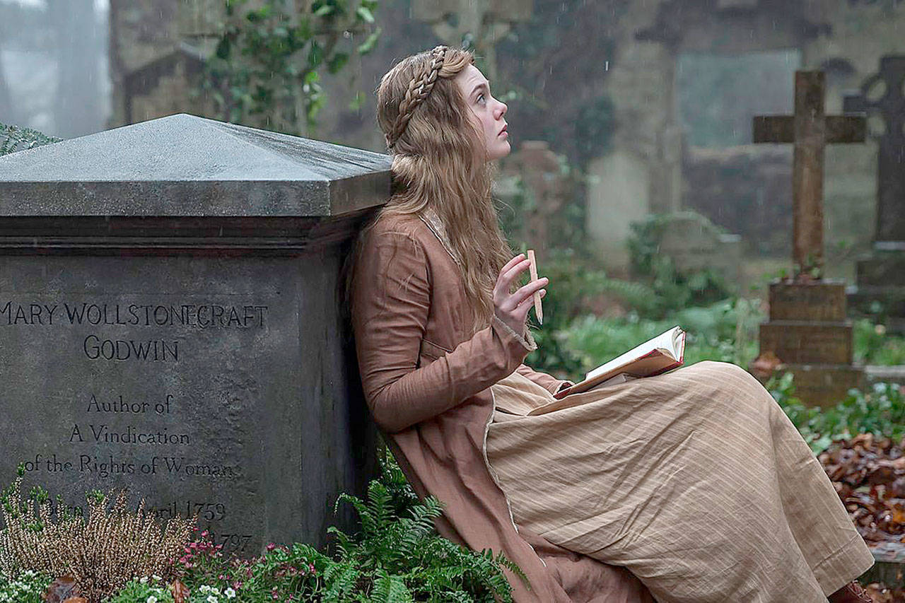 “Frankenstein” author Mary Shelley (Elle Fanning) visits the grave of her mother, also a brilliant writer and radical thinker, in “Mary Shelley.” (IFC Films)