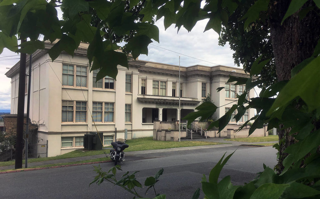 Estimates put the Longfellow building demolition and redevelopment costs at about $1.3 million. The site then will be used for parking. (Sue Misao / The Herald)

