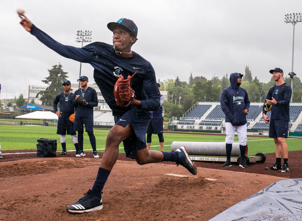 Dayeison Arias throws a pitch during practice at Everett Memorial Stadium in Everett Wednesday afternoon on June 12, 2018. (Kevin Clark / The Herald)

