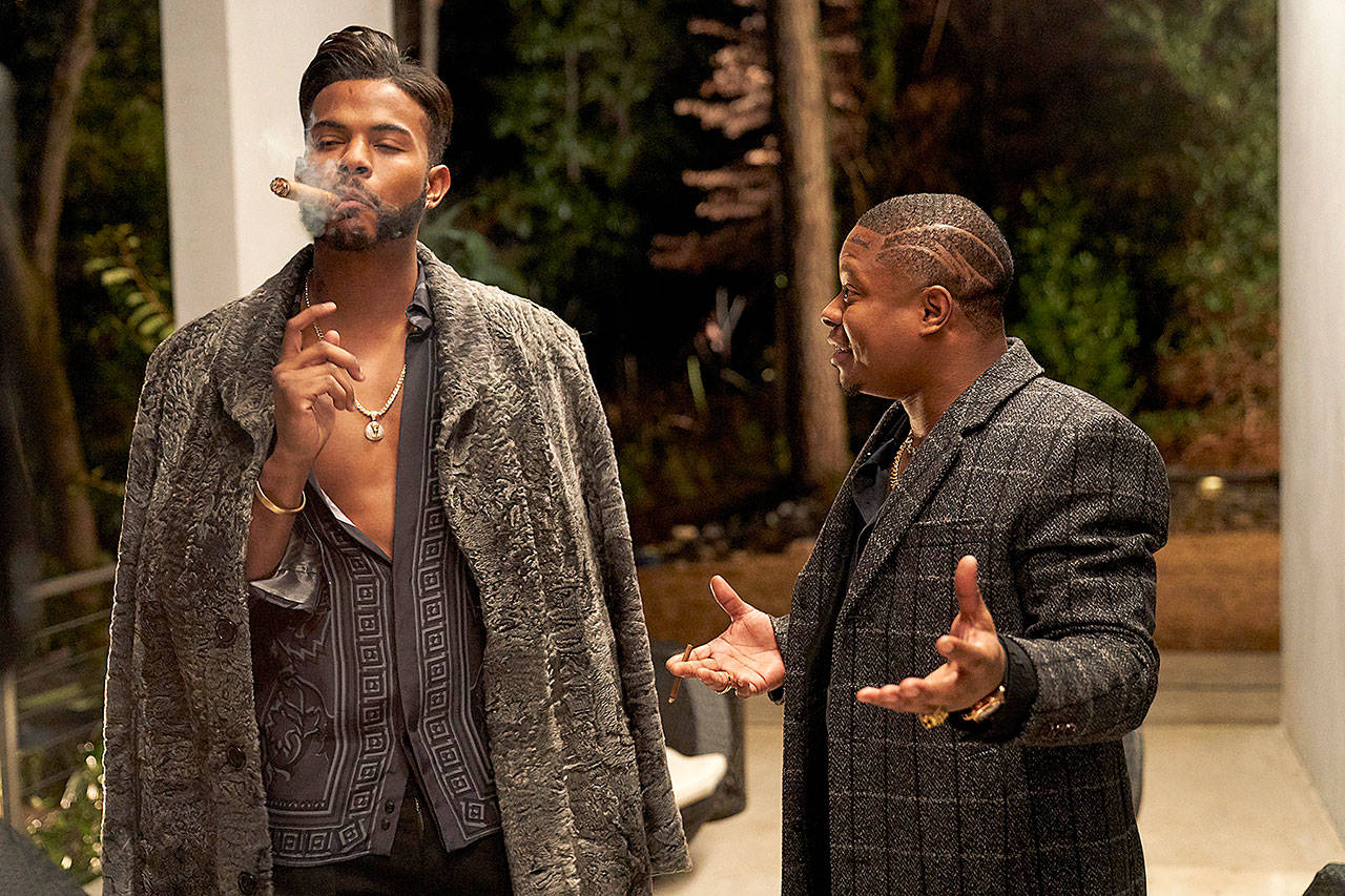 Trevor Jackson (left) plays a powerful drug dealer and Jason Mitchell is his partner in “SuperFly.” (Sony Pictures Entertainment)