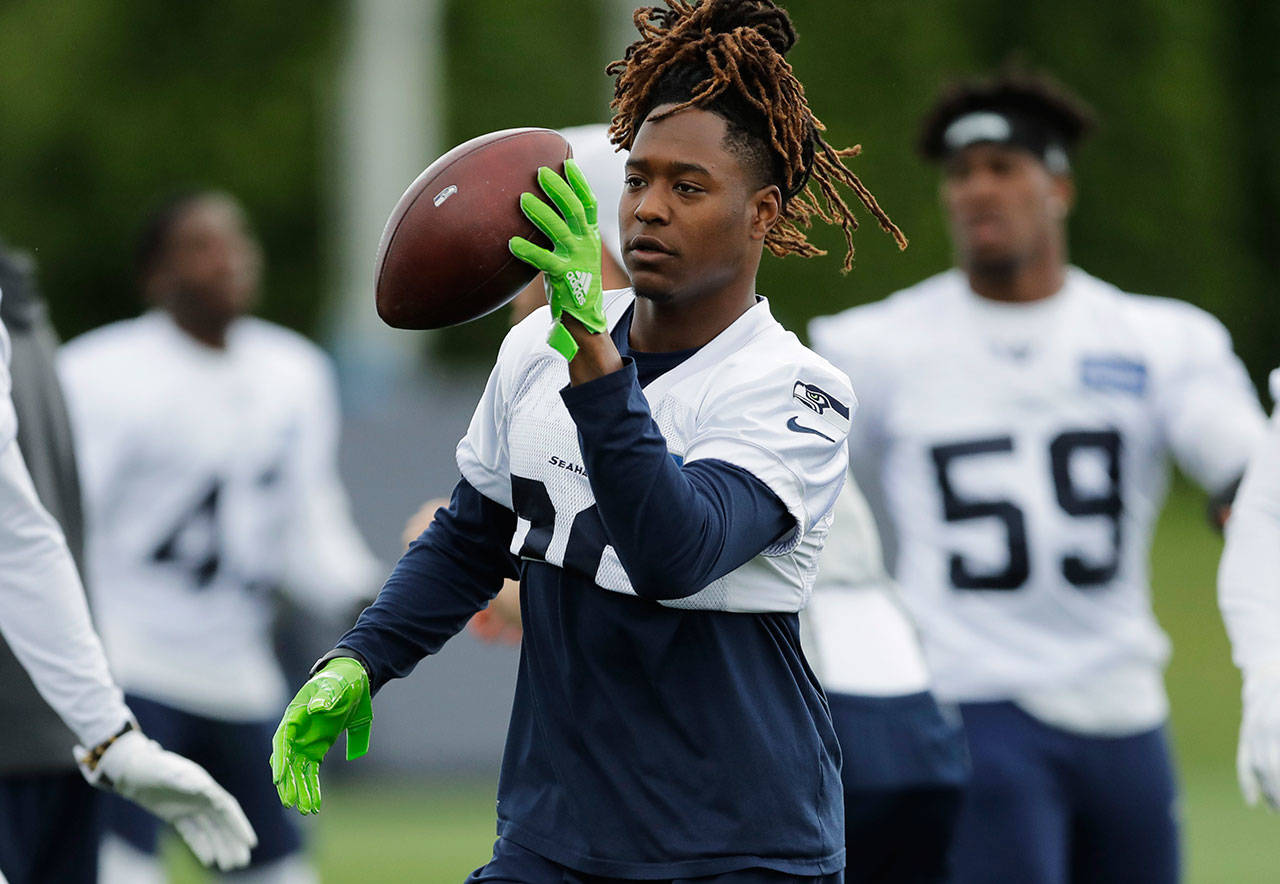 Seahawks cornerback Shaquill Griffin holds a football during a practice on June 14, 2018, in Renton. Griffin is moving to left cornerback, taking over the position vacated by Richard Sherman when he was released and signed by the 49ers. (AP Photo/Ted S. Warren)