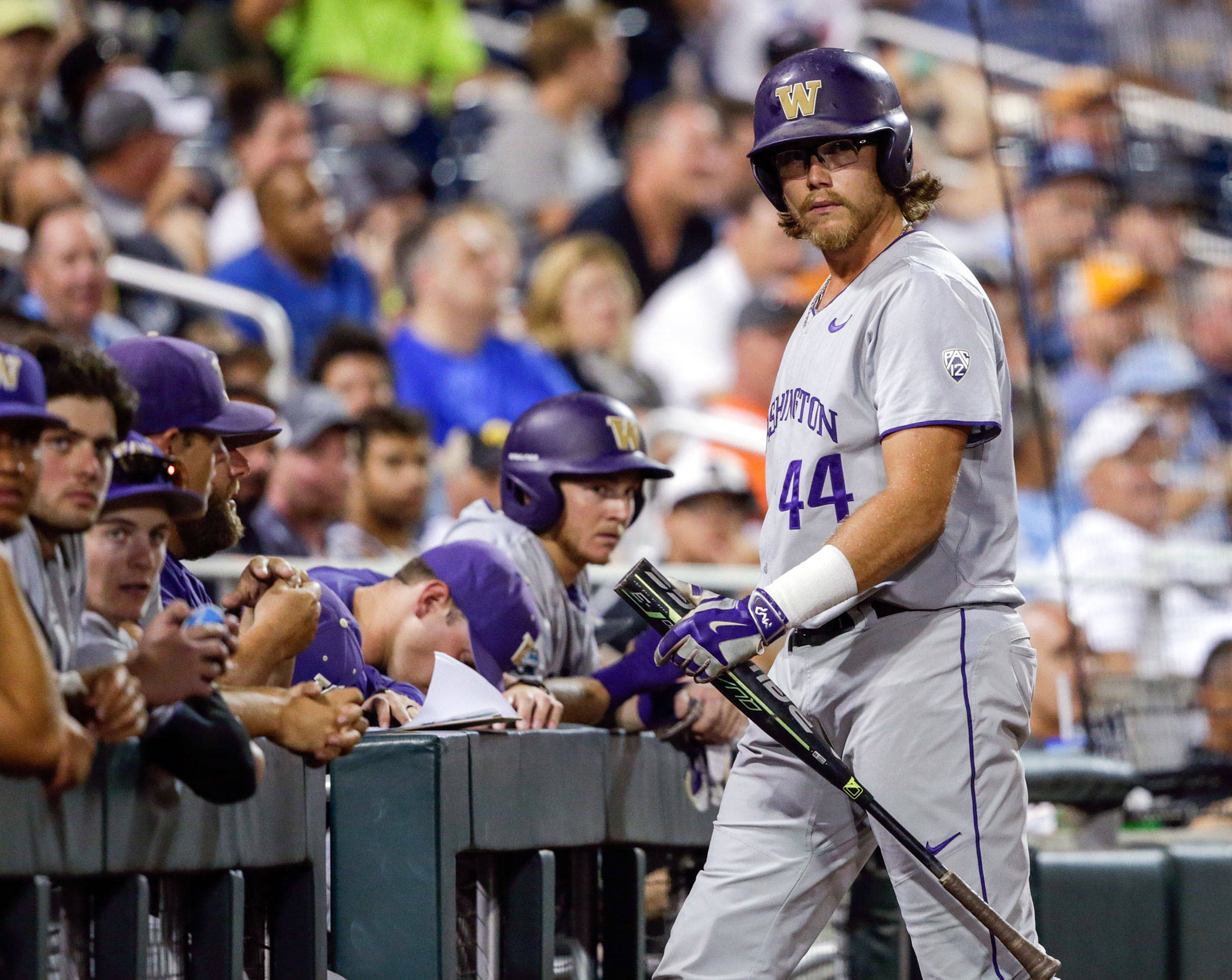 Washington designated hitter Joe Wainhouse walks off after striking out during the ninth inning against Mississippi State at the College World Series on June 16, 2018, in Omaha, Neb. (AP Photo/Nati Harnik)