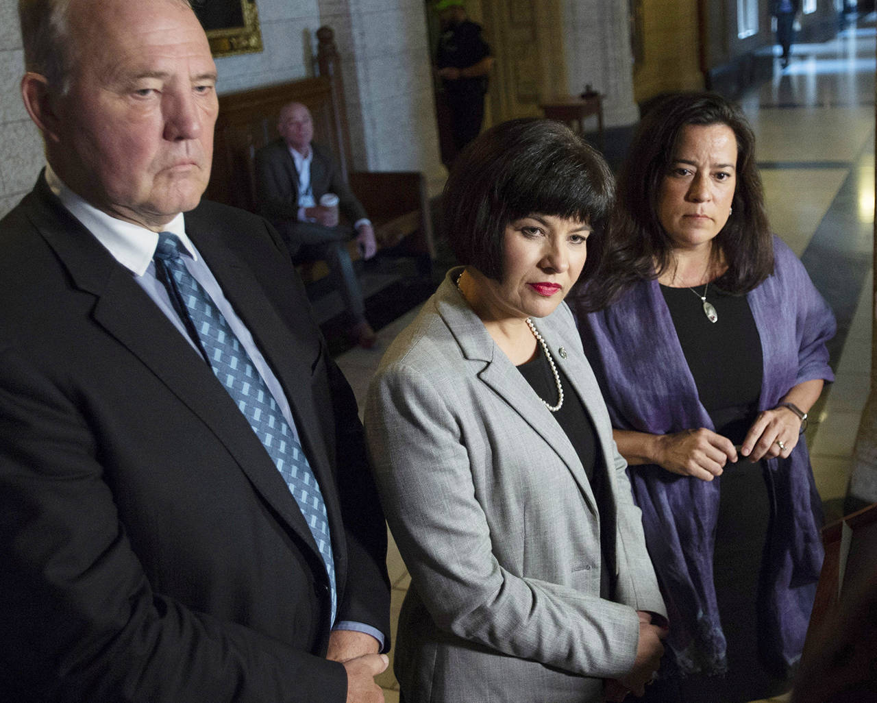 Minister of Justice and Attorney General of Canada Jody Wilson-Raybould (right), Minister of Health Ginette Petitpas Taylor (center), and Parliamentary Secretary to the Minister of Justice and Attorney General of Canada and to the Minister of Health Bill Blair (left) listen to questions during a press conference on Bill C-45, the Cannabis Act, in the Foyer of the House of Commons on Parliament Hill in Ottawa, Ontario on Wednesday. (Justin Tang/The Canadian Press via AP)